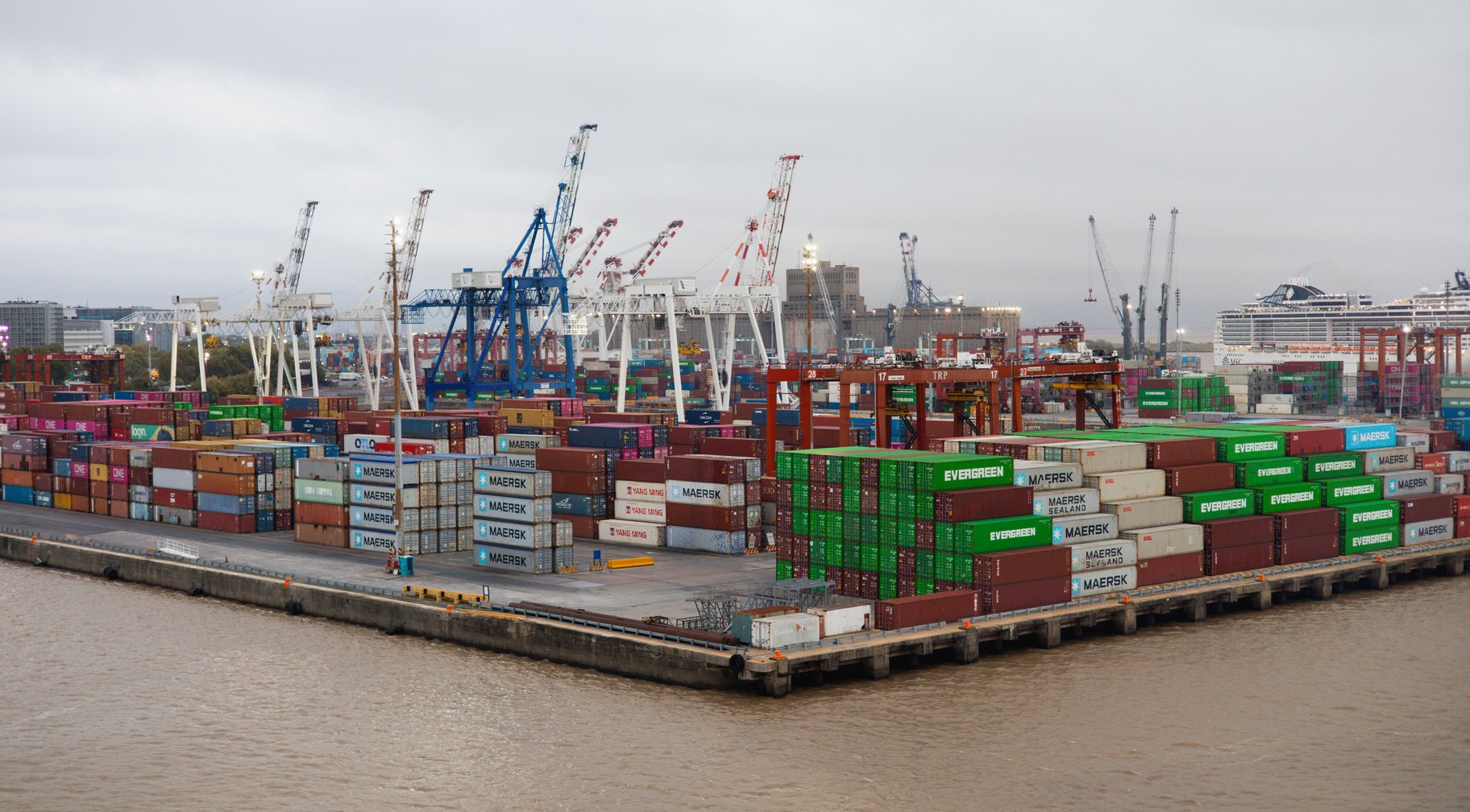 Stacked containers and cranes at Southampton docks
