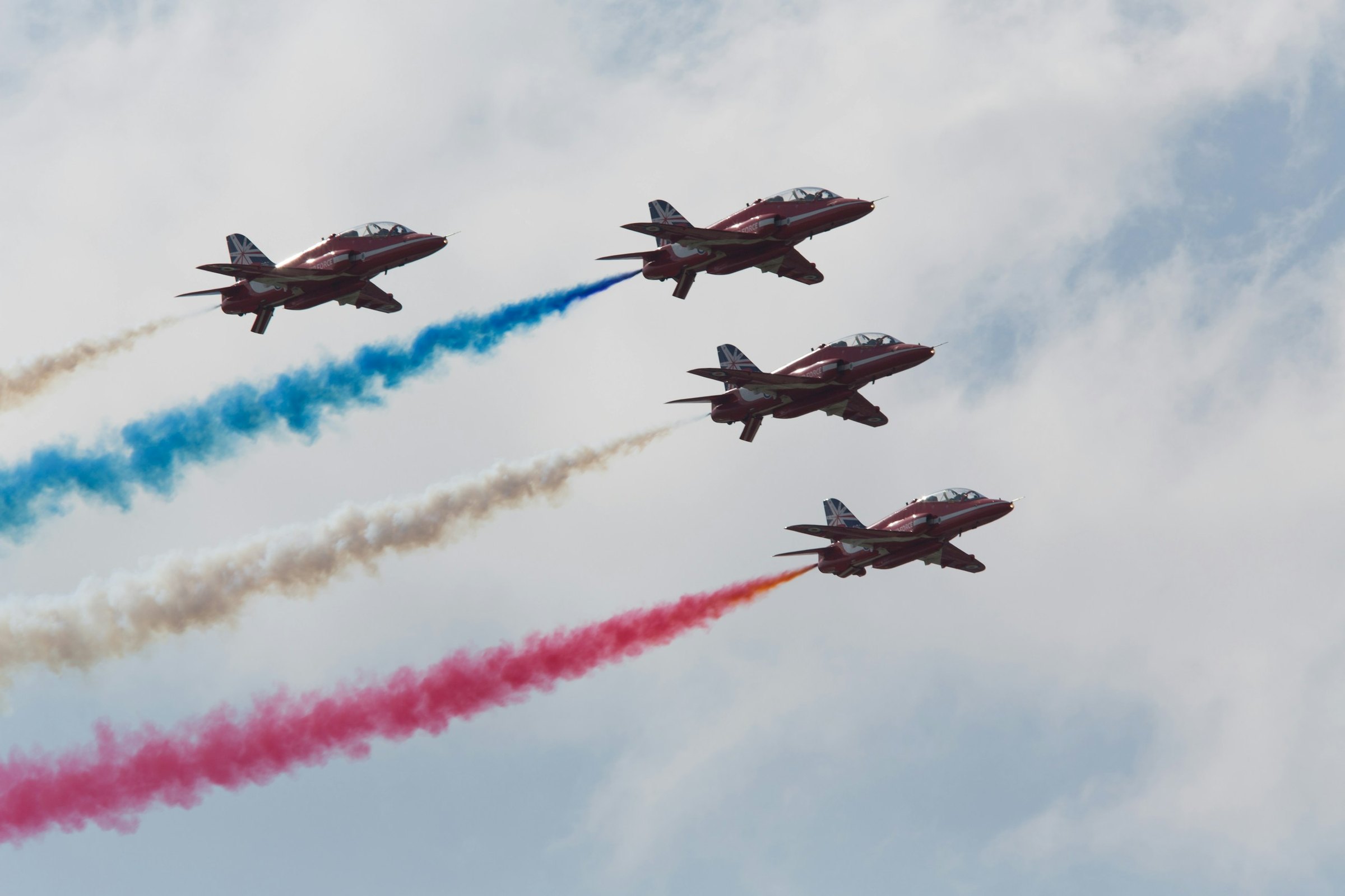 The Red Arrows flying in formation over Farnborough
