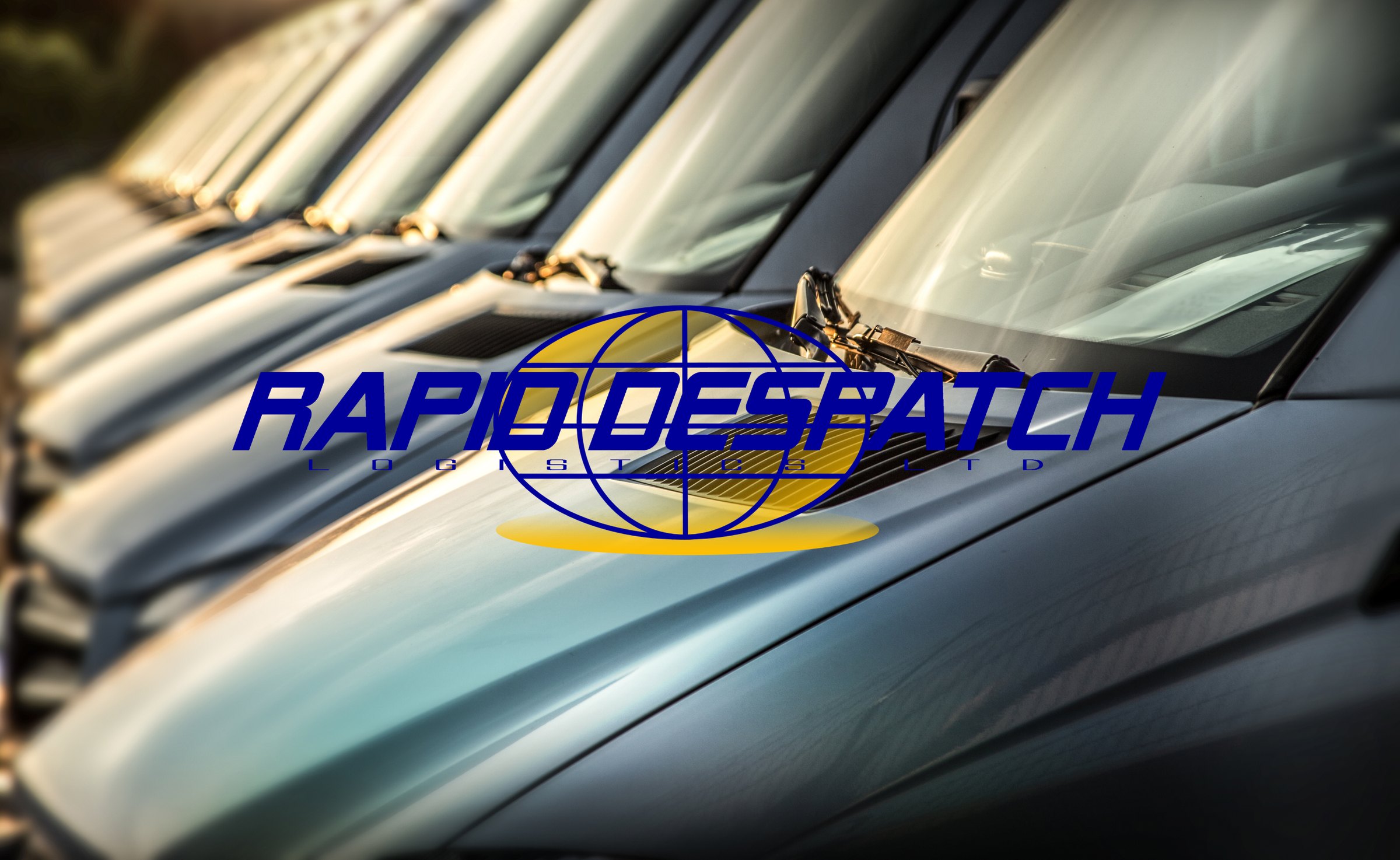 Rapid Despatch vans lined up with the company logo across them