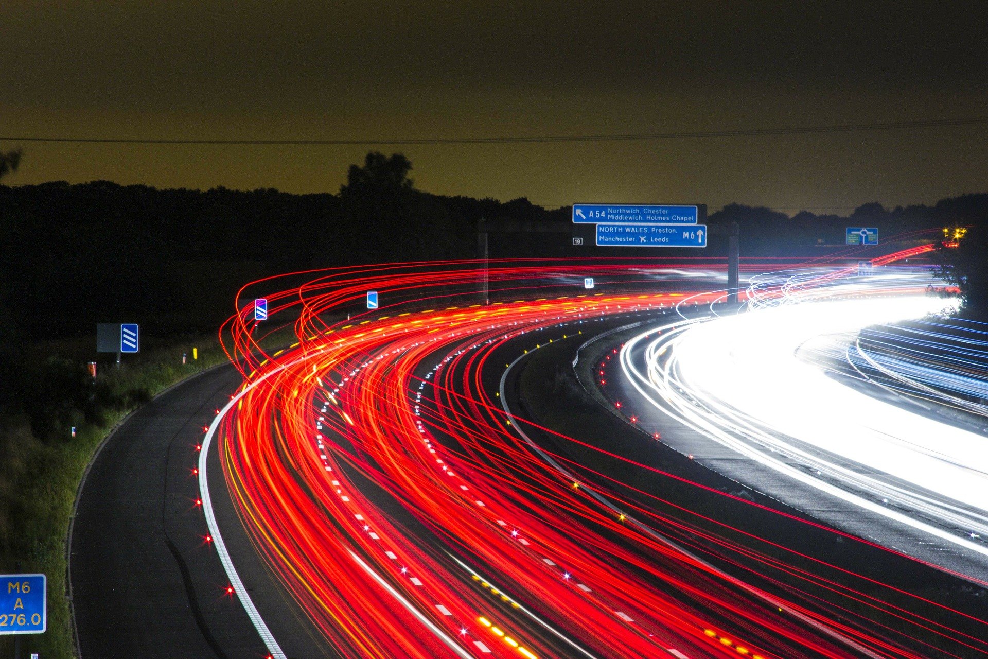 Traffic including vans moving along a motorway