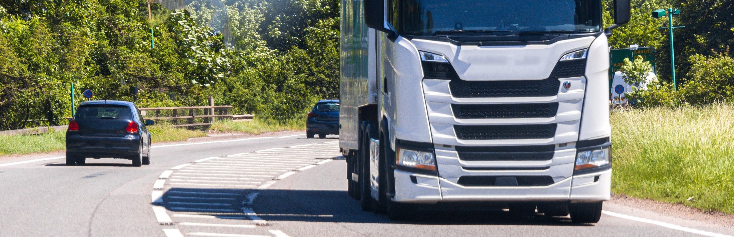 An articulated lorry on a main road