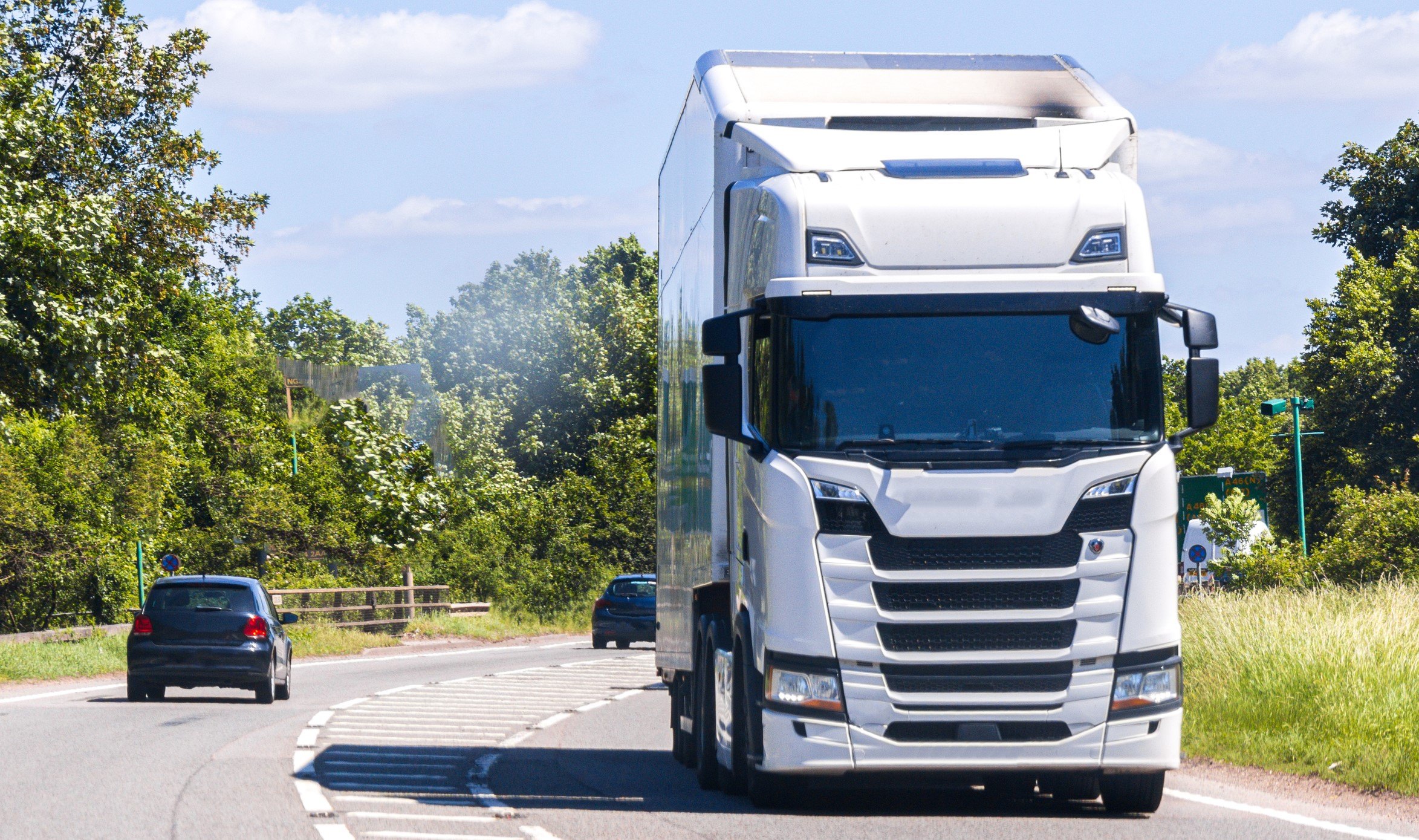 An articulated lorry on a main road