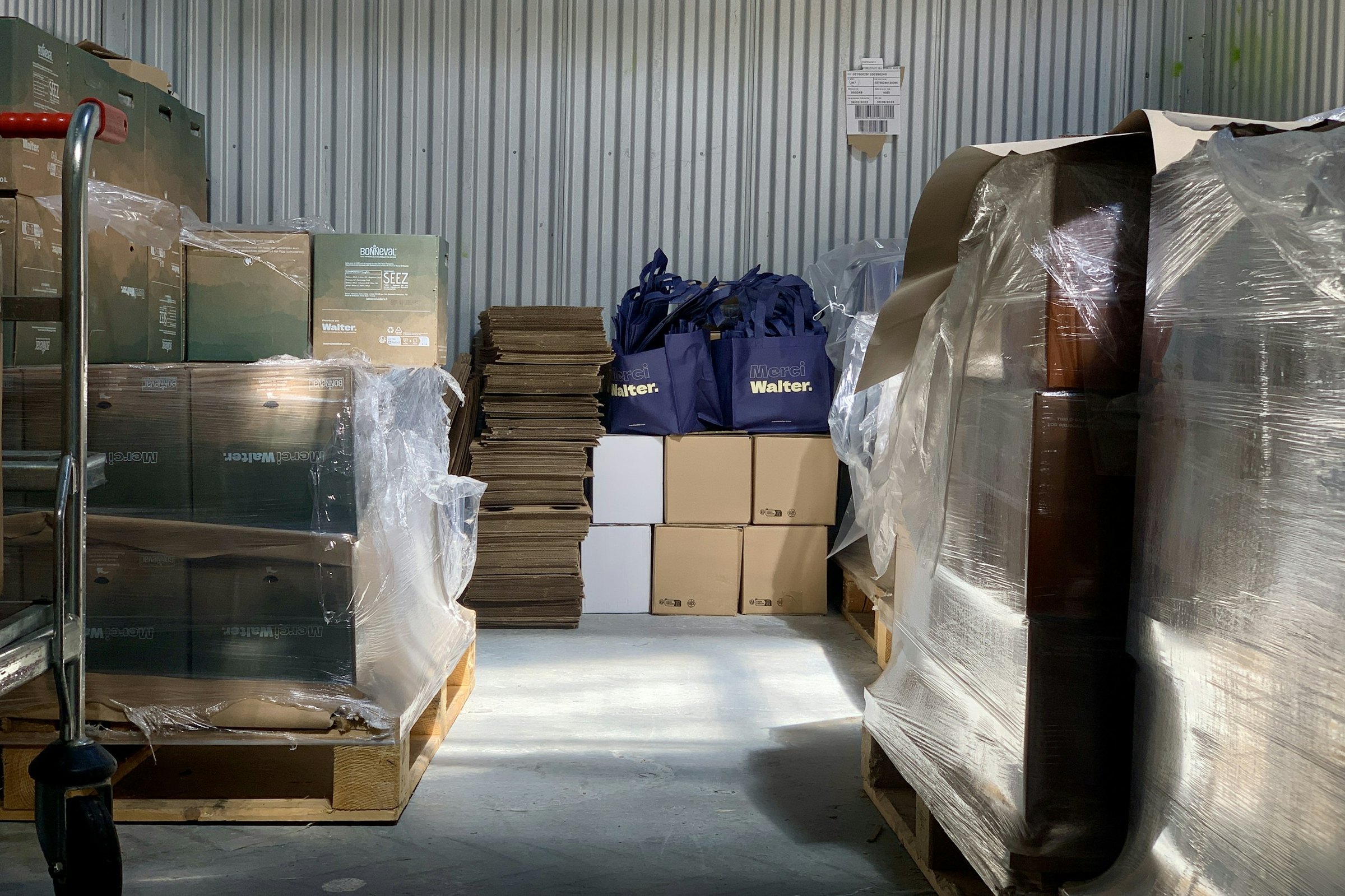 Wrapped and stacked cardboard boxes ready for despatch in a warehouse