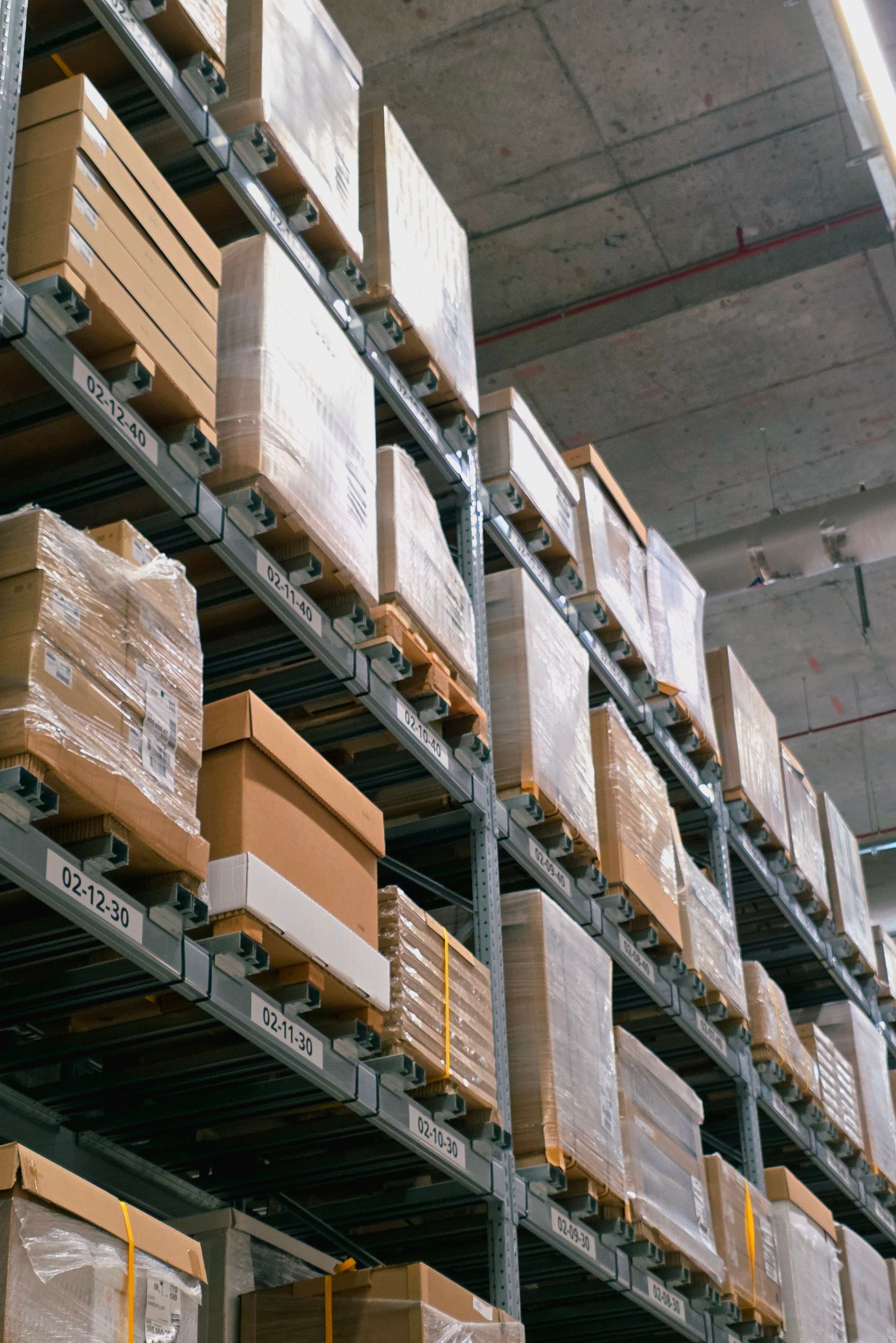 Cardboard boxes stacked and wrapped in a warehouse
